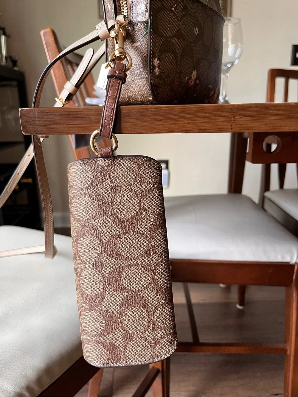 Coach glasses pouch in Signature khaki/tan! Clip on your bag or belt loop!